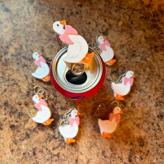 Goose with pink bow soda can tab opener keychain