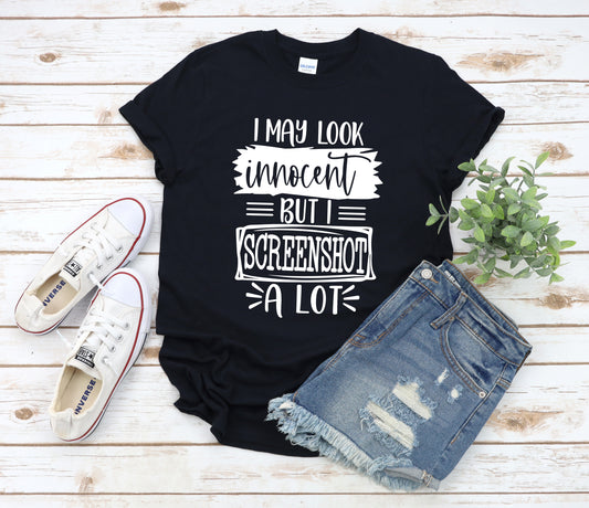 I may look innocent but I screenshot a lot Completed Shirt *Choose size from drop down menu* 7-10 Business days TAT